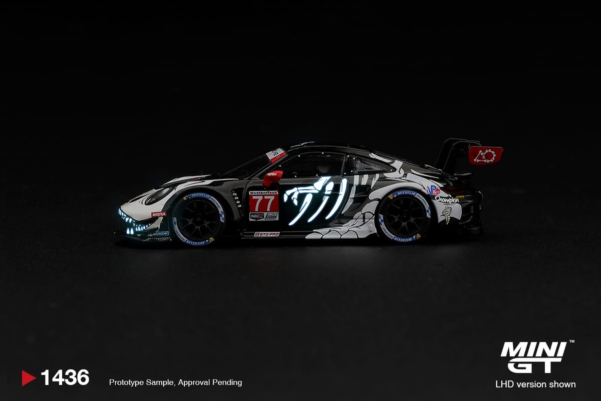 Mini GT Porsche 911 GT3 R 992 #77 AO Racing Skeleton Rexy 2026 Glow in the Dark Box 1:64 - view 2