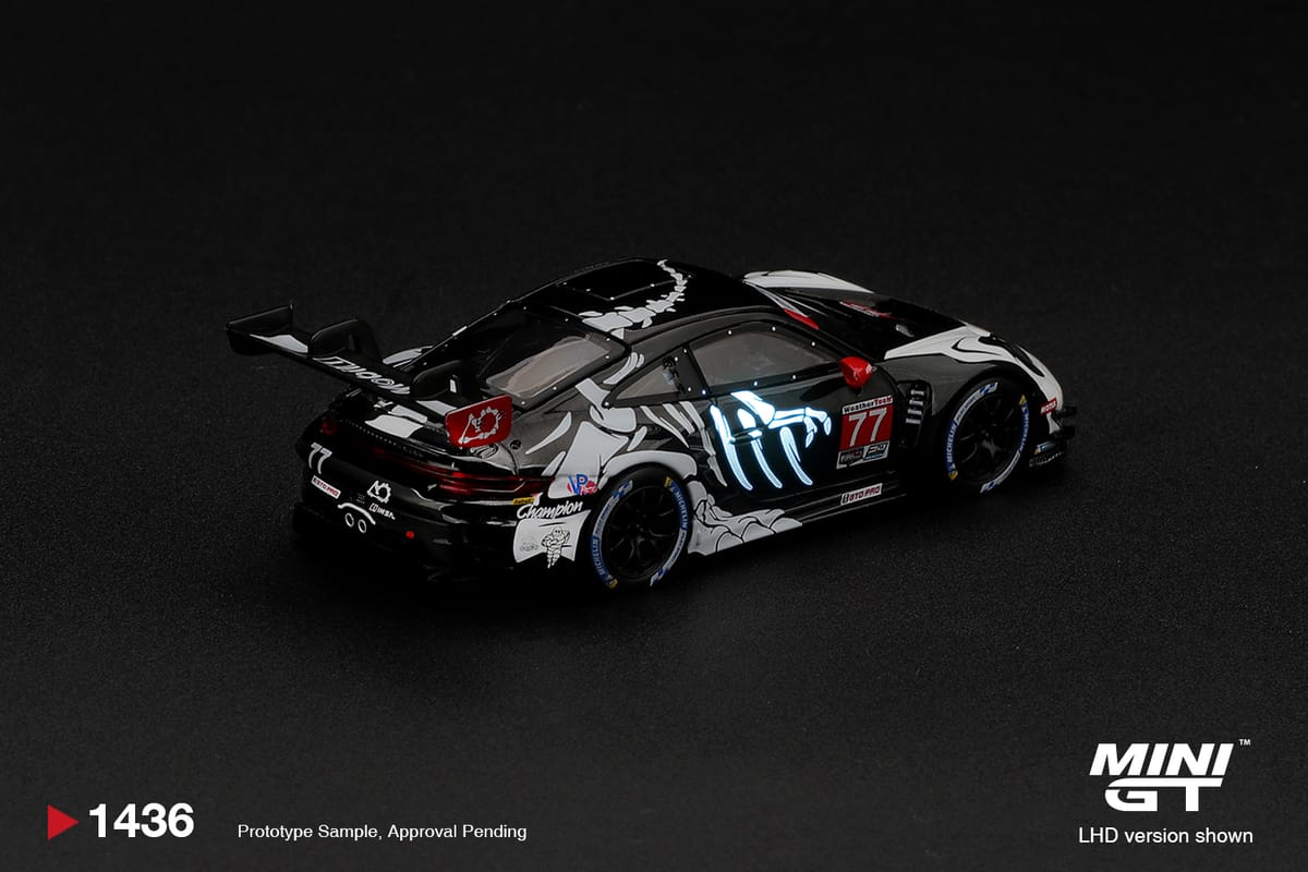 Mini GT Porsche 911 GT3 R 992 #77 AO Racing Skeleton Rexy 2026 Glow in the Dark Box 1:64 - view 3