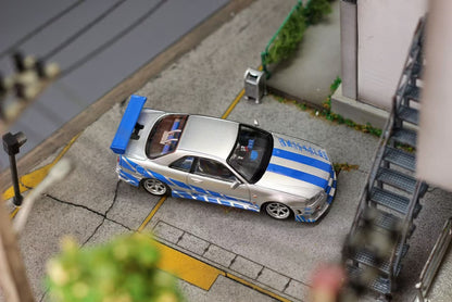 Mega Mega - Skyline GT-R R34 Movie Version Diecast Model - Silver Blue Livery - 1:64 Scale Model - PRE ORDER