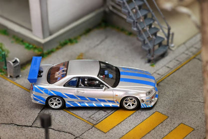 Mega Mega - Skyline GT-R R34 Movie Version Diecast Model - Silver Blue Livery - 1:64 Scale Model - PRE ORDER